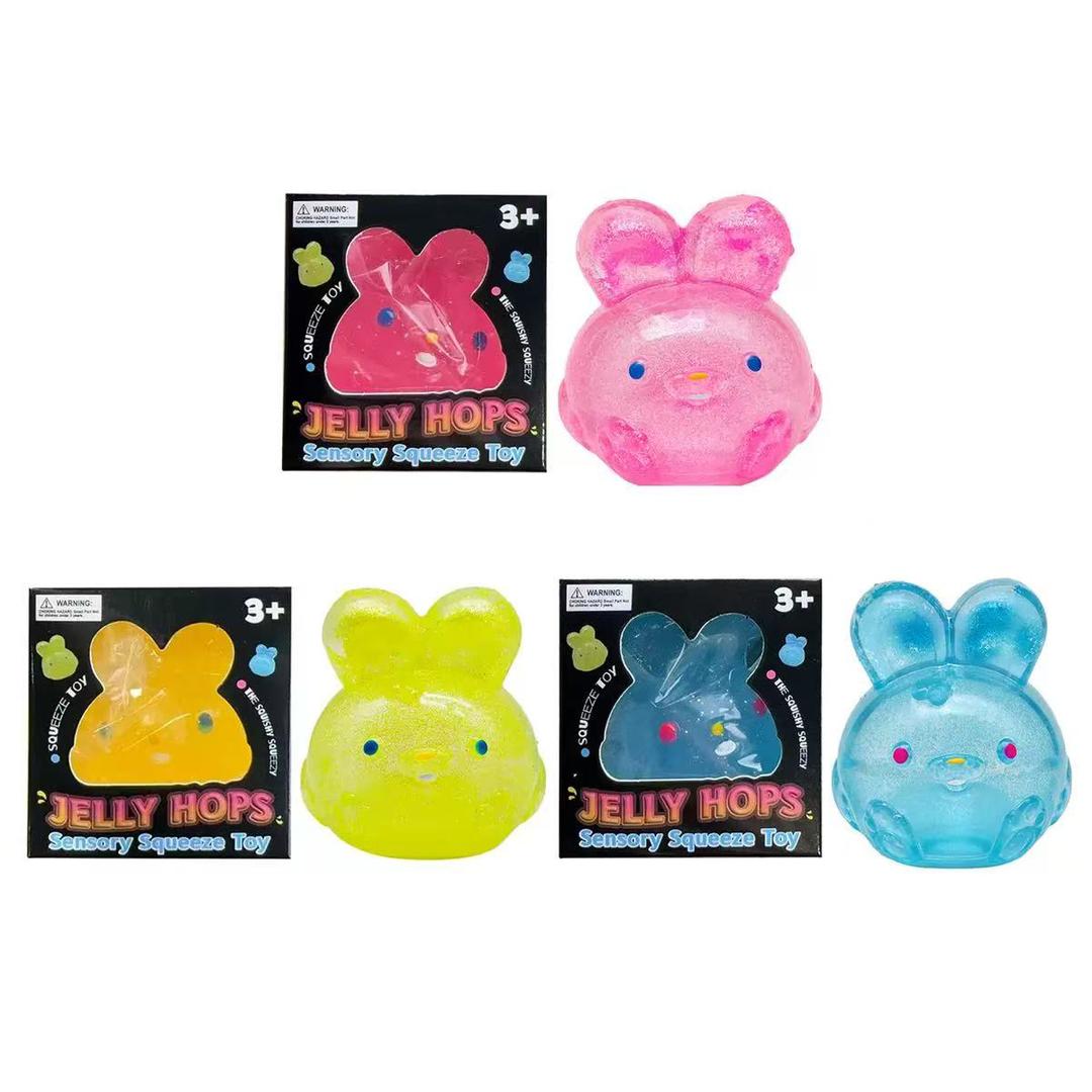 NeeDoh Jelly Hops | Scented Bunny Squishy Toys for Kids & Adults | Solid Squish Animal Shape Sensory Toy | Stress Relief Glitter Squishes | Novelty Gifts for Easter Baskets | Small Fidgets for Age 3+